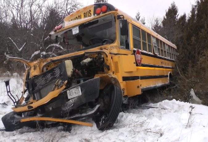 Three people escaped before a train struck a school bus in Colborne, Ont., last February.