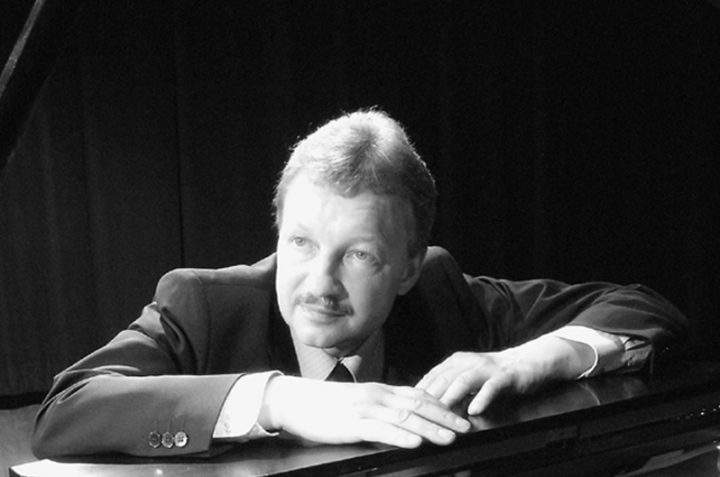 A Coquitlam piano teacher has been charged with three counts of sexual assault involving former students.