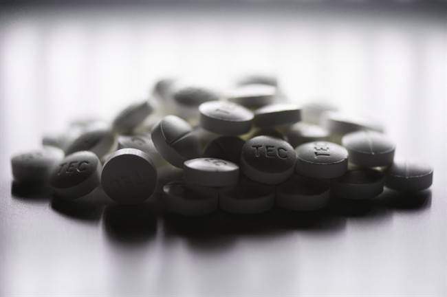 Prescription pills containing oxycodone and acetaminophen, two types of opioids, are shown in this June 20, 2012 photo.