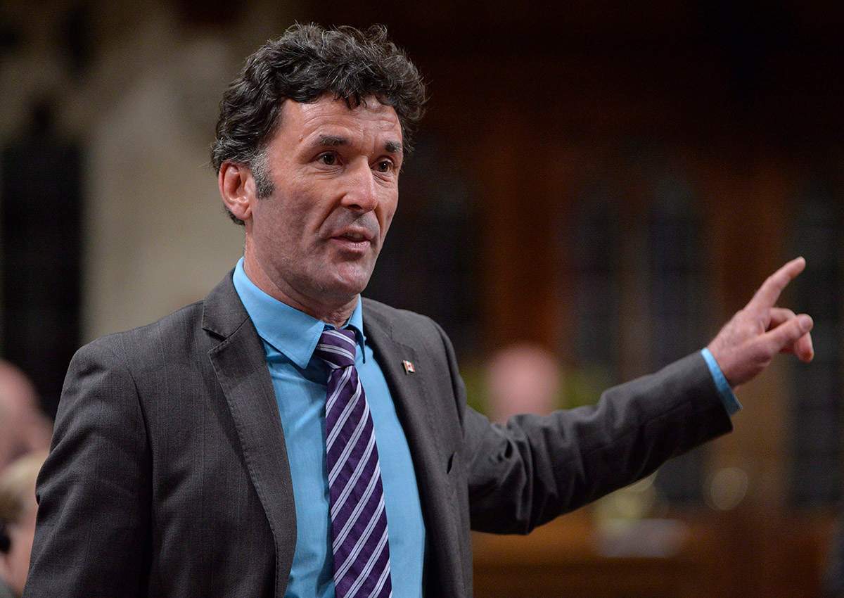 NDP MP Paul Dewar asks a question during Question Period in the House of Commons in Ottawa on September 29, 2014. 