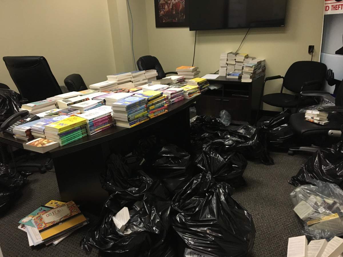 Calgary businessman collects discarded books to donate