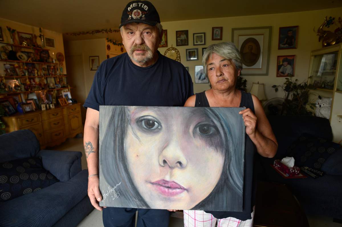 WINNIPEG, MB – SEPTEMBER 9: Joe and Thelma Favel and a framed collage tribute to their niece, Tina Fontaine, who was murdered and her body dumped in the Red River. (Jim Rankin/Toronto Star via Getty Images)