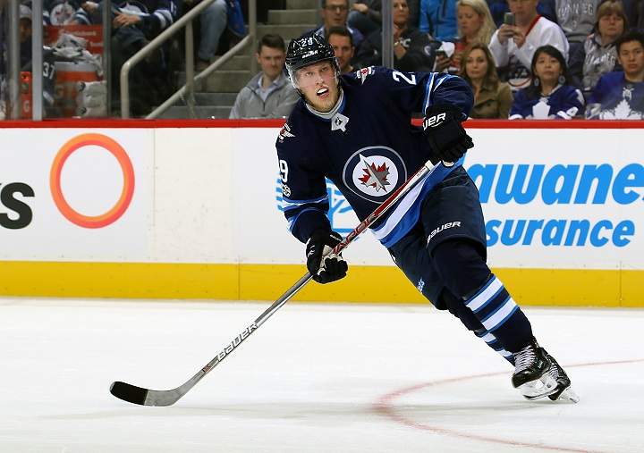 WINNIPEG, MB – OCTOBER 4: Patrik Laine #29 of the Winnipeg Jets keeps an eye on the play during second period action against the Toronto Maple Leafs at the Bell MTS Place on October 4, 2017 in Winnipeg, Manitoba, Canada. (Photo by Jonathan Kozub/NHLI via Getty Images)