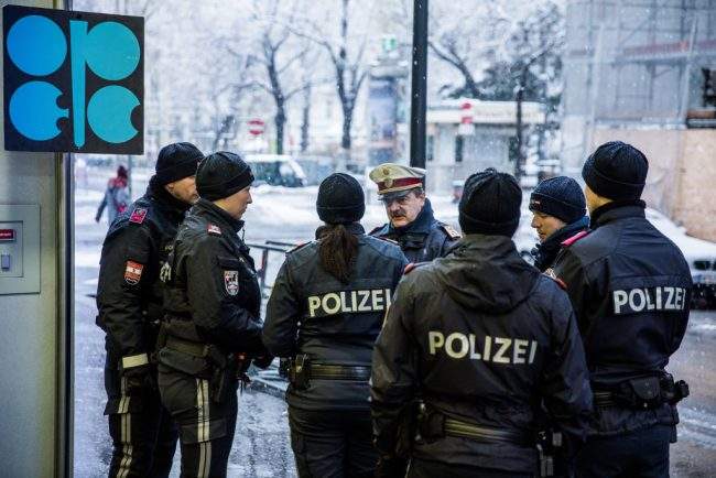 Austrian police officers stand guard outside the OPEC Secretariat ahead of the 173rd Organization of Petroleum Exporting Countries (OPEC) meeting in Vienna, Austria, on Thursday, Nov. 30, 2017. 


