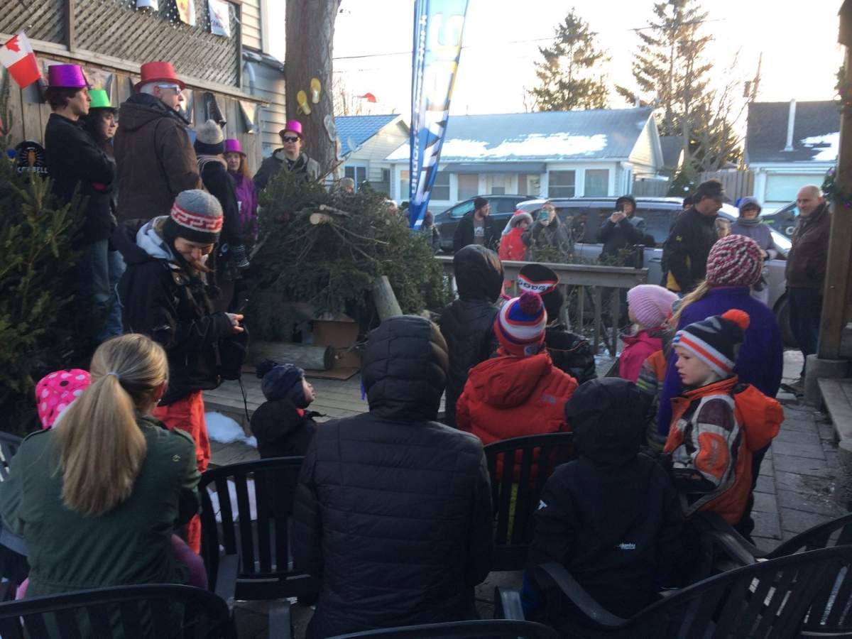 A crowd gathers at the Pierside Pub in Port Stanley to hear Princess Sandy's prediction (980 CFPL).