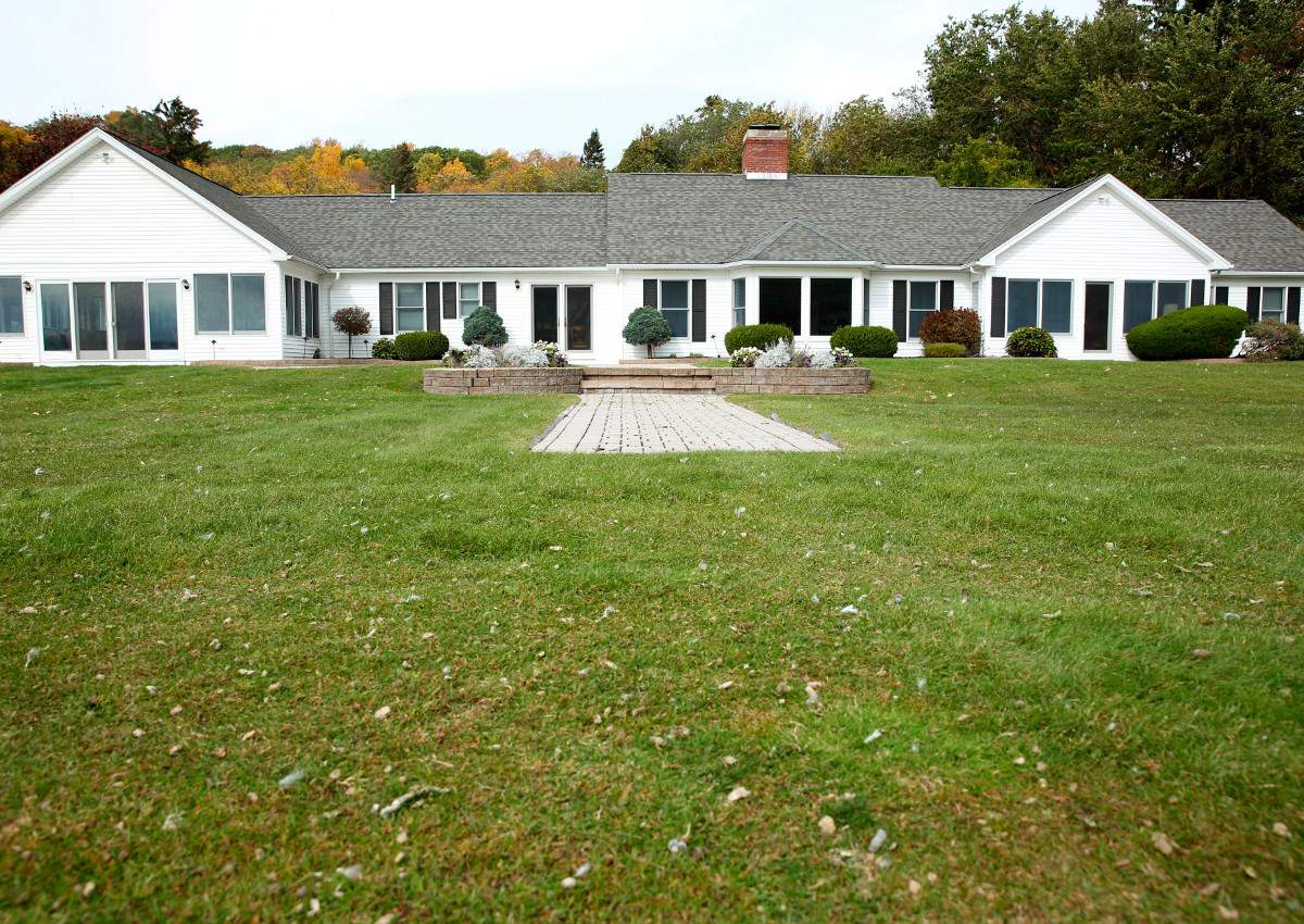In this Oct. 23, 2017 photo, the front lawn of billionaire businessman and philanthropist Tom Golisano's summer home on Canandaigua Lake in South Bristol, N.Y, is shown.