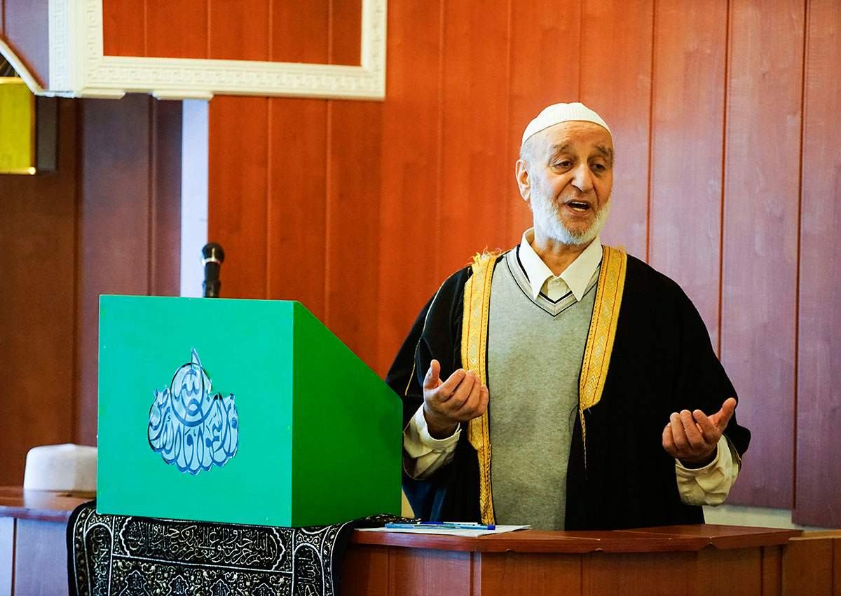 In this Feb. 23, 2018, photo, Imam Salmann Tamimi addresses the congregation at The ReykjavÃ­k Mosque during Friday midday prayers. 
