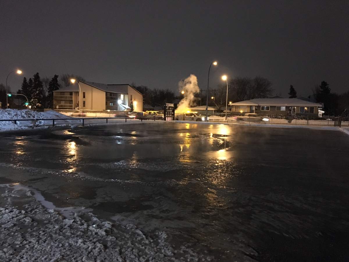 EPCOR crews responded to to 111 Avenue between 129 Street and 130 Street Wednesday morning, where water was flooding the road by the adjacent Westmount Junior High School. Edmonton, Alta. January 7, 2018.