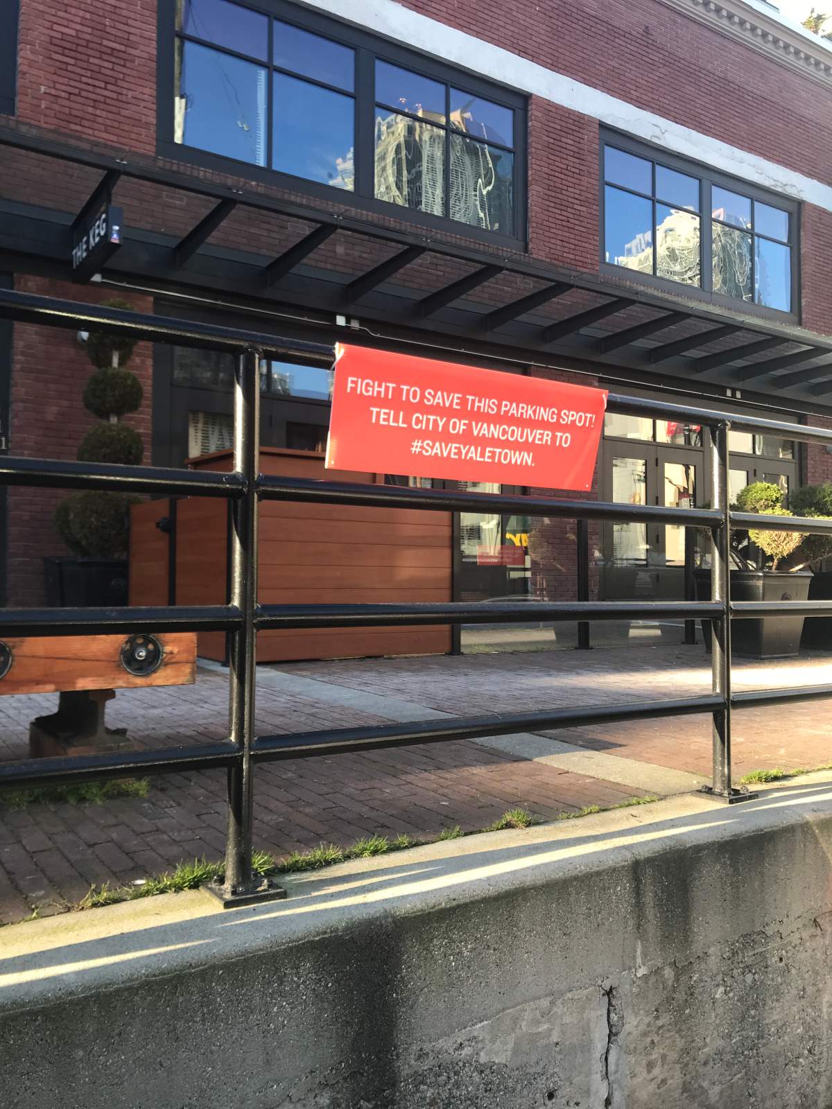 Business owners in Vancouver’s Yaletown rally against planned parking changes - image