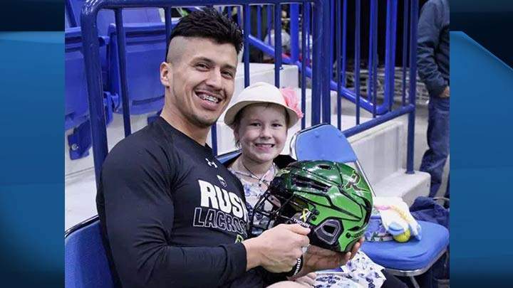 Naomi Lendvay with Saskatchewan Rush player Jeremy Thompson.