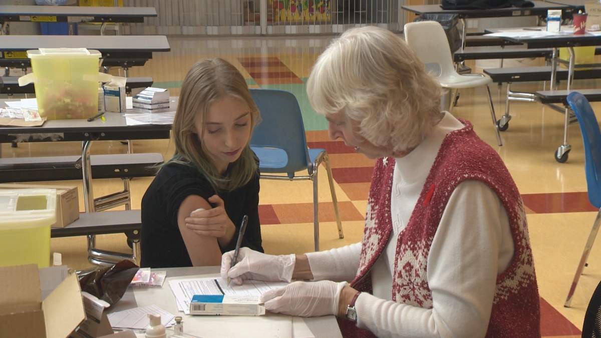 A student in Oliver is vaccinated for meningococcal disease. 