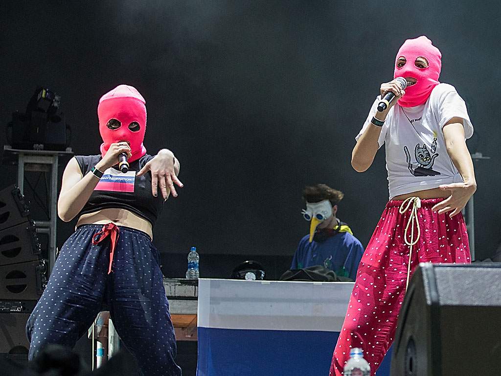 Nadezhda Tolokonnikova (R) of Pussy Riot performs onstage during the Day for Night festival on December 16, 2017 in Houston, Texas.