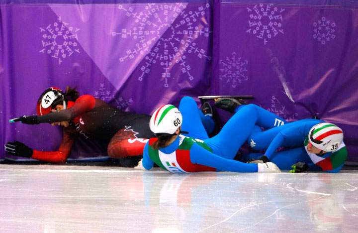 Valerie Maltais of Canada, Cecilia Maffei and Lucia Peretti of Italy fall.