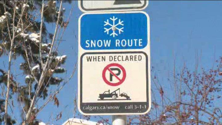 Snow Route parking sign.