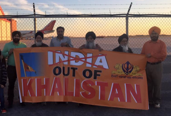 TV84’s Manveer Singh Saini, wearing a green shirt, Sukhminder Singh Hansra (fourth from left) and other activists protest Indian Prime Minister Narendra Modi’s visit to Canada in Ottawa, Apr. 14, 2015.
