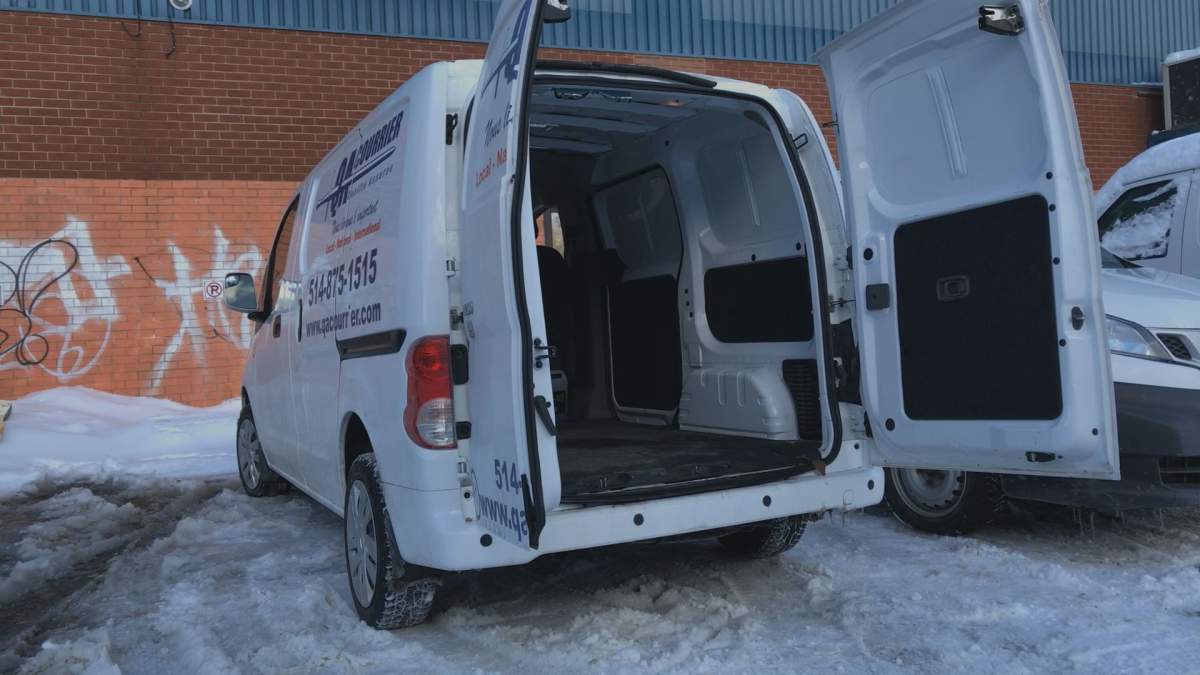 A QA Courier truck picking up deliveries on Feb. 12, 2018.