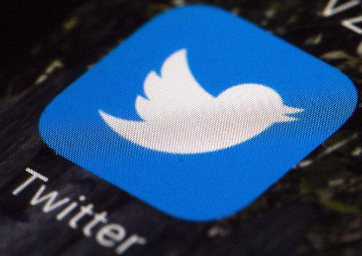 This April 26, 2017, file photo shows the Twitter icon on a mobile phone, in Philadelphia. Twitter reports earnings Thursday, Feb. 8, 2018. 