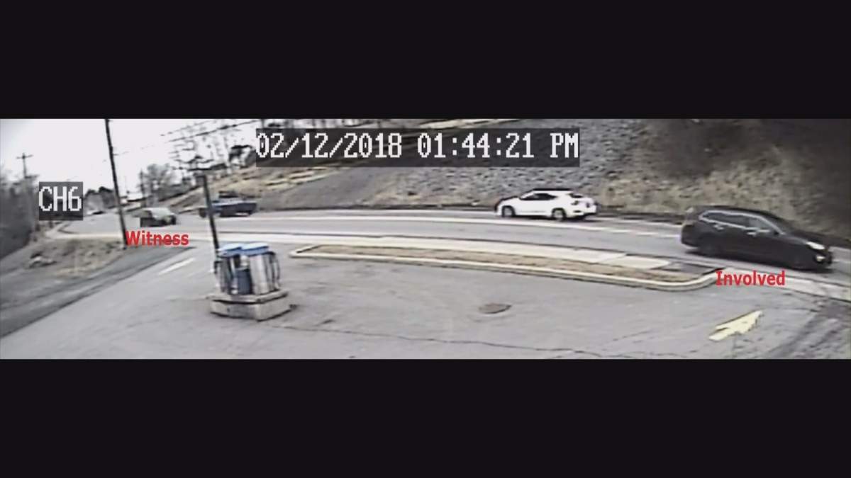 RCMP released this surveillance photo of the black vehicle that they believe was the intended target and a possible witness vehicle.