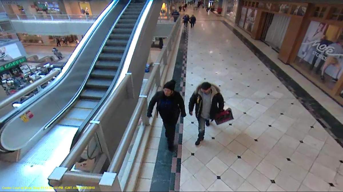 The two suspects are seen in this surveillance camera image from the Halifax Shopping Centre.