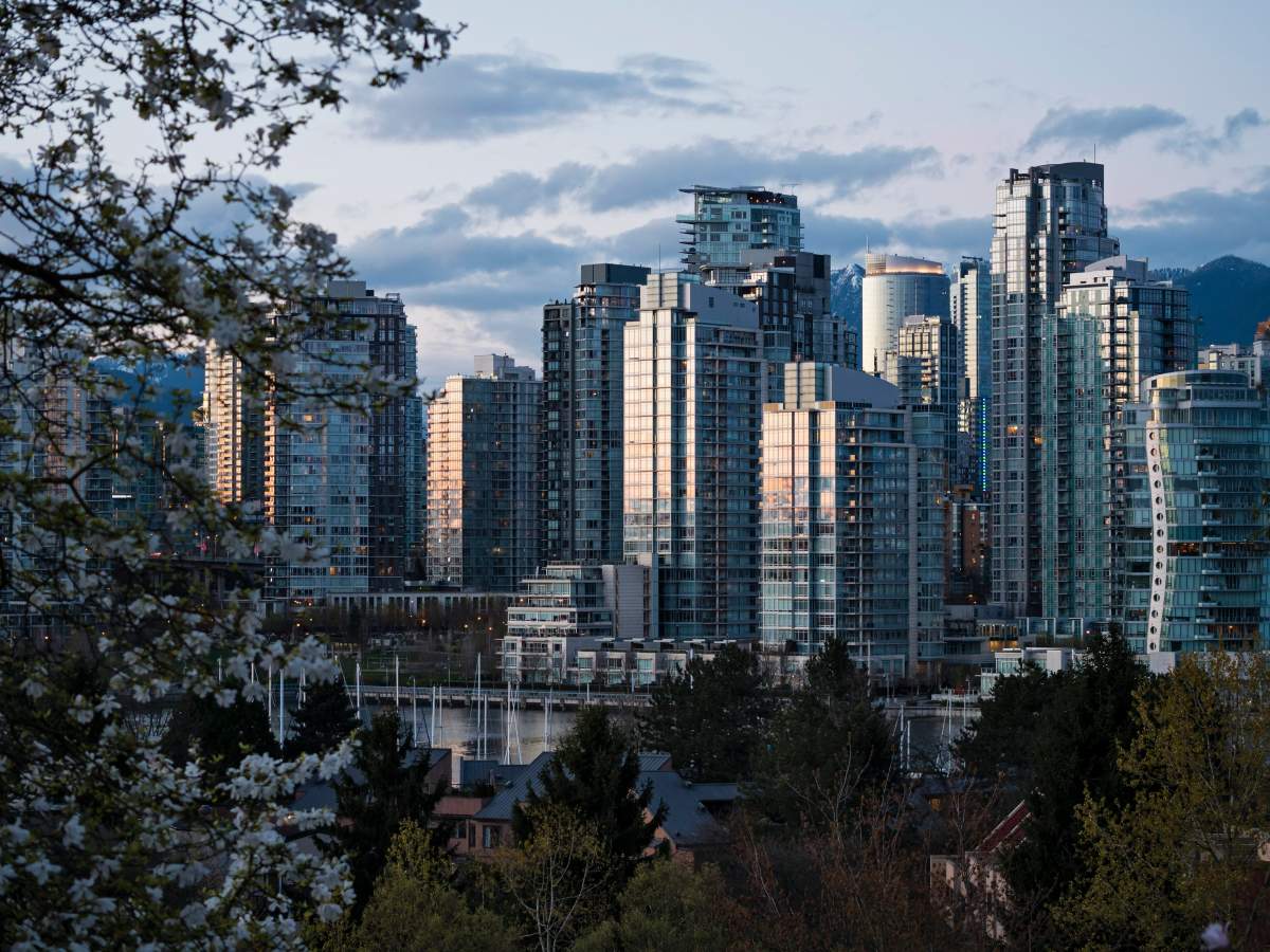 FILE - An analyst looked at the cost of buying three properties in Vancouver, along with all the attendant expenses, against renting each one.