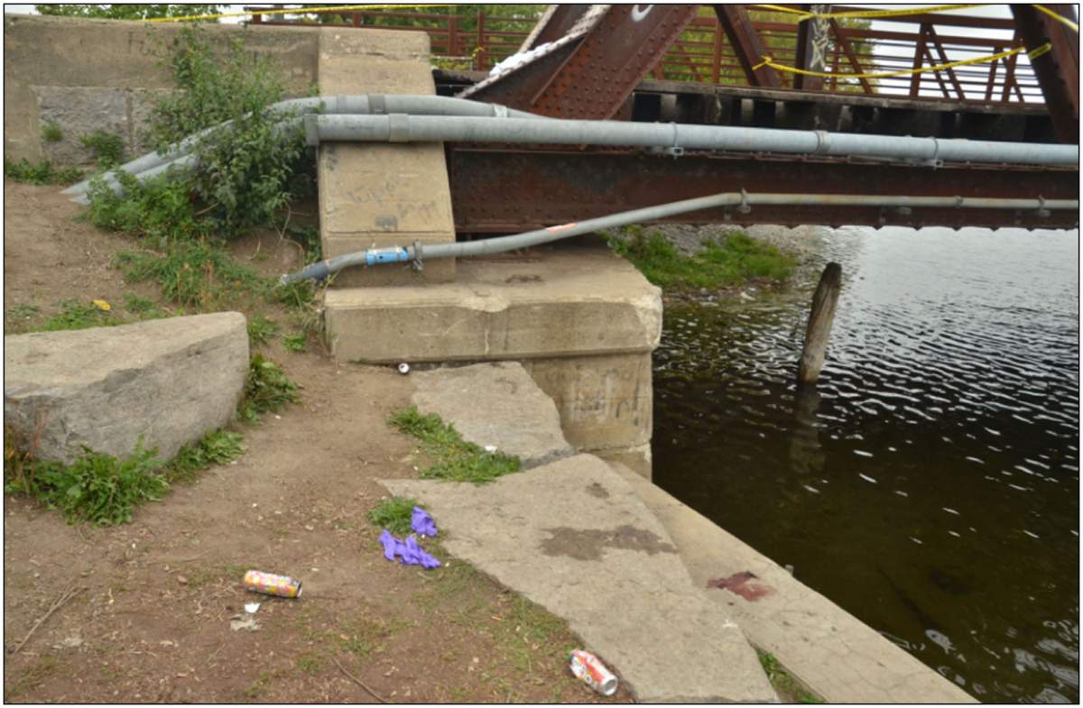 The area where the man struck his head on a concrete embankment.