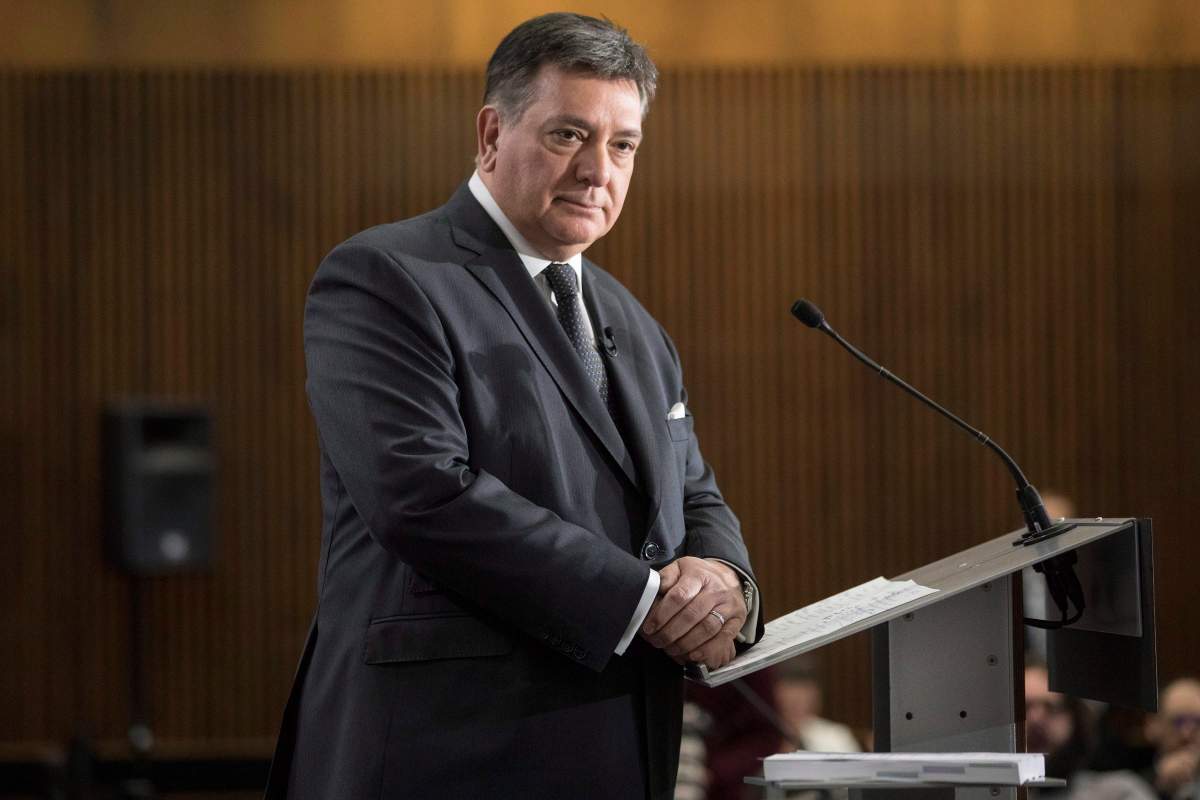 Provincial Finance Minister Charles Sousa takes questions from journalists during a pre-budget lock-up as the Ontario Provincial Government prepares to deliver its 2018 Budget at the Queens Park Legislature in Toronto on Wednesday March 28, 2018. THE CANADIAN PRESS/Chris Young