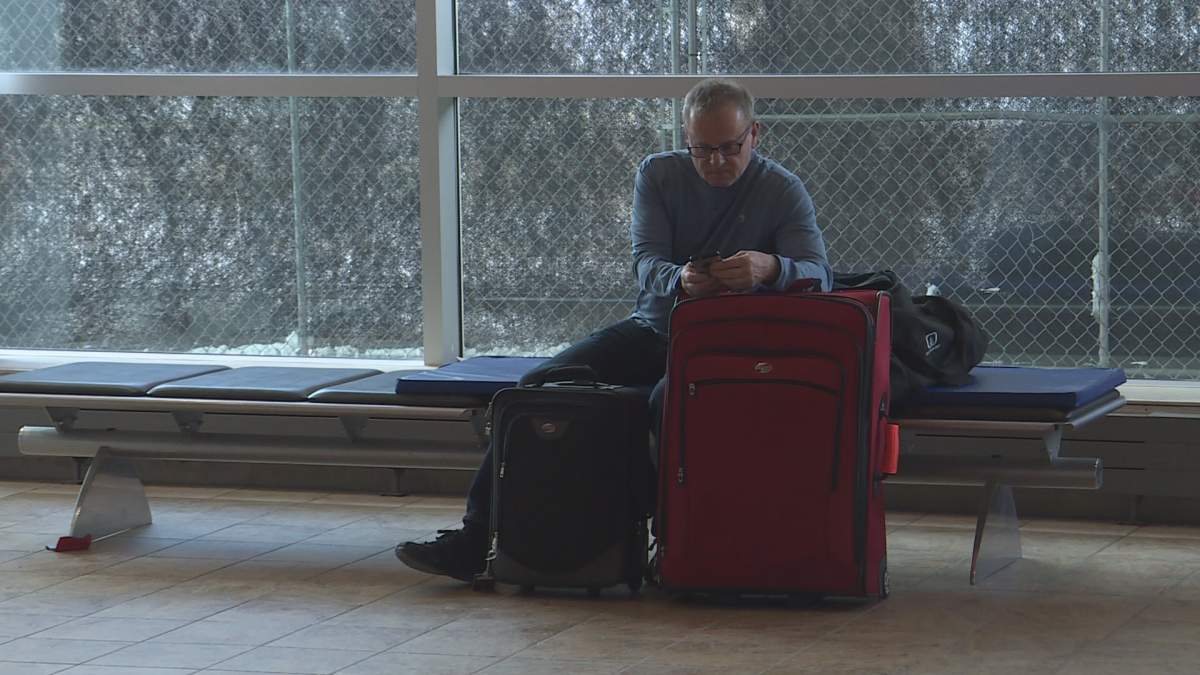 Mark Veaudry says he and other passengers stranded at the Halifax airport are in ‘a pickle’ but are optimistic.