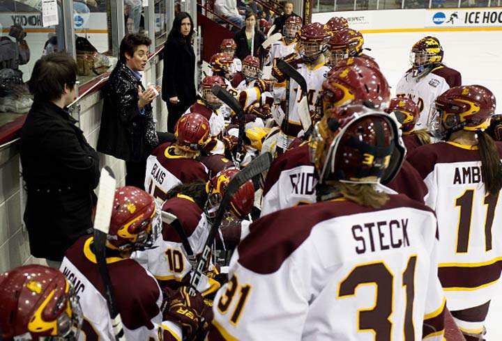 UMD women's hockey head coach Shannon Miller speaks to her team in the first period of the Division I Women's Ice Hockey Championship held in Minneapolis, Minn. 