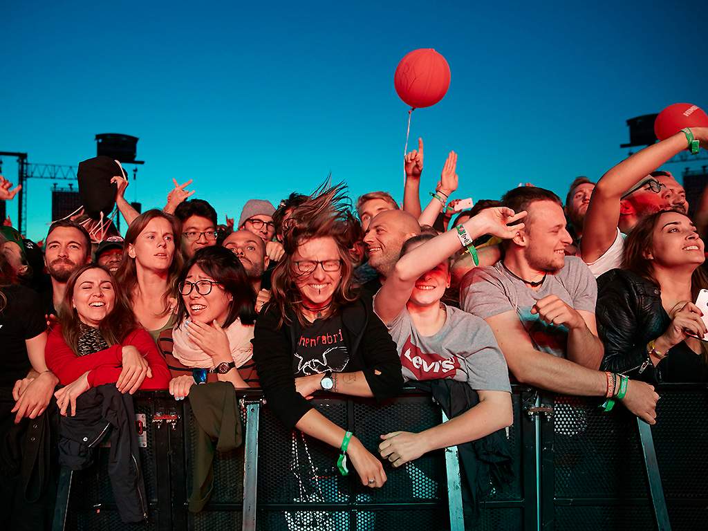 Fans revel in the front row during the Lollapalooza Berlin music festival on September 10, 2017 in Dahlwitz-Hoppegarten, Germany.