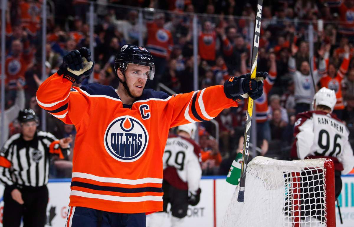Edmonton Oilers' Connor McDavid celebrates scoring the game-winning goal during overtime NHL hockey action against the Colorado Avalanche in Edmonton, Thursday, Feb. 22, 2018.
