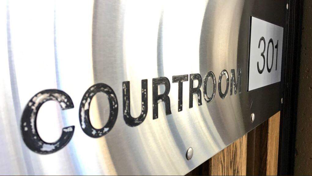Guelph police say officers saw the man in a cell trying to hide something on Thursday morning.
