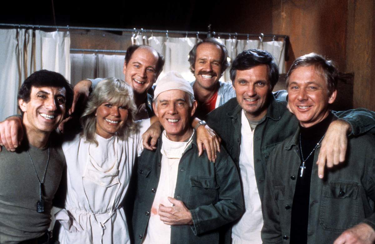 Jamie Farr, Loretta Swit, David Ogden Stiers, Harry Morgan, Mike Farrell, Alan Alda, and William Christopher in publicity portrait for the film ‘M*A*S*H’, Circa 1978.