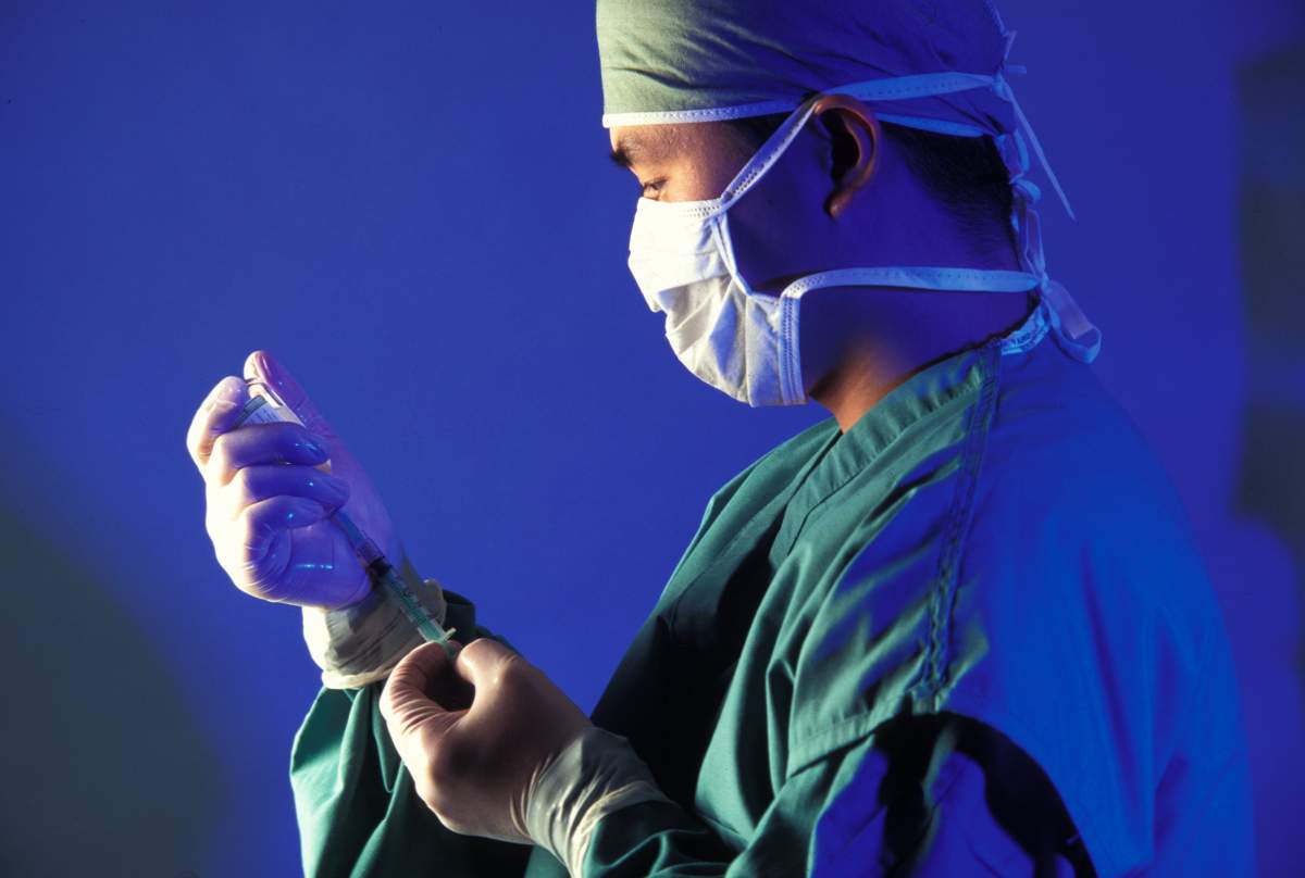 FILE - Disease X isn't yet known to exist, but health officials recognize that the next big outbreak could come from a virus they've not yet encountered, so they want to be ready.
