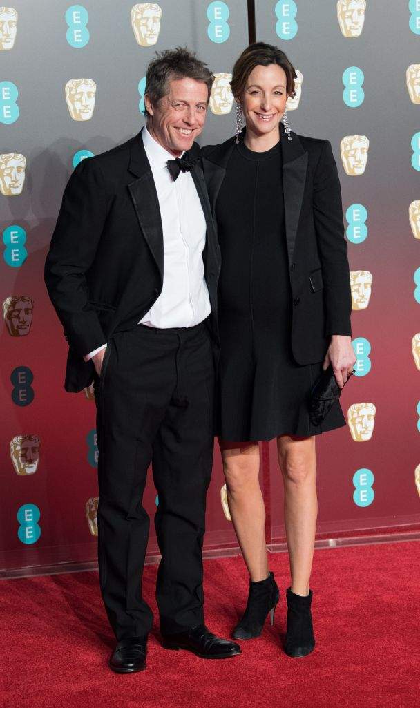Hugh Grant with girlfriend Anna Eberstein — Getty