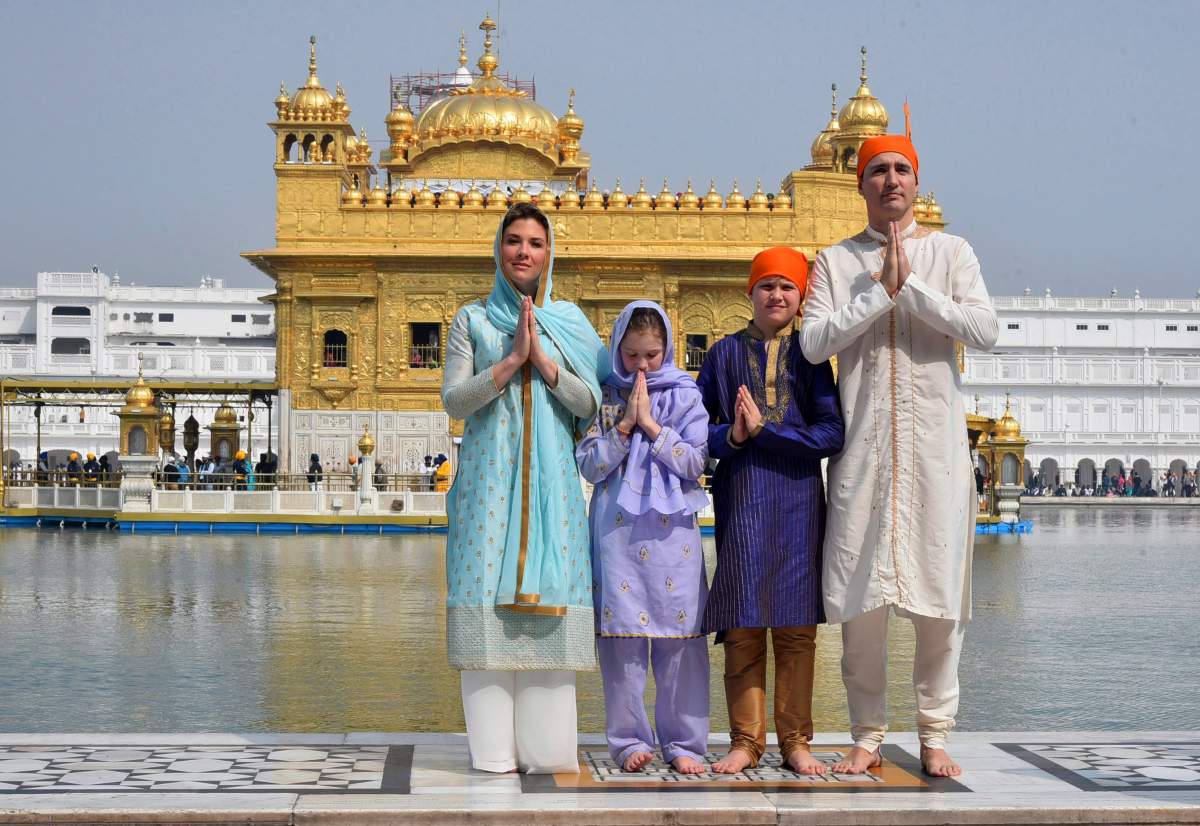 Canadian Prime Minister Justin Trudeau, right, his wife Sophie Gregoire Trudeau, left, their daughter Ella Grace, second left, and son Xavier greet in Indian style during their visit to Golden Temple, in Amritsar, India, Wednesday, Feb. 21, 2018.
