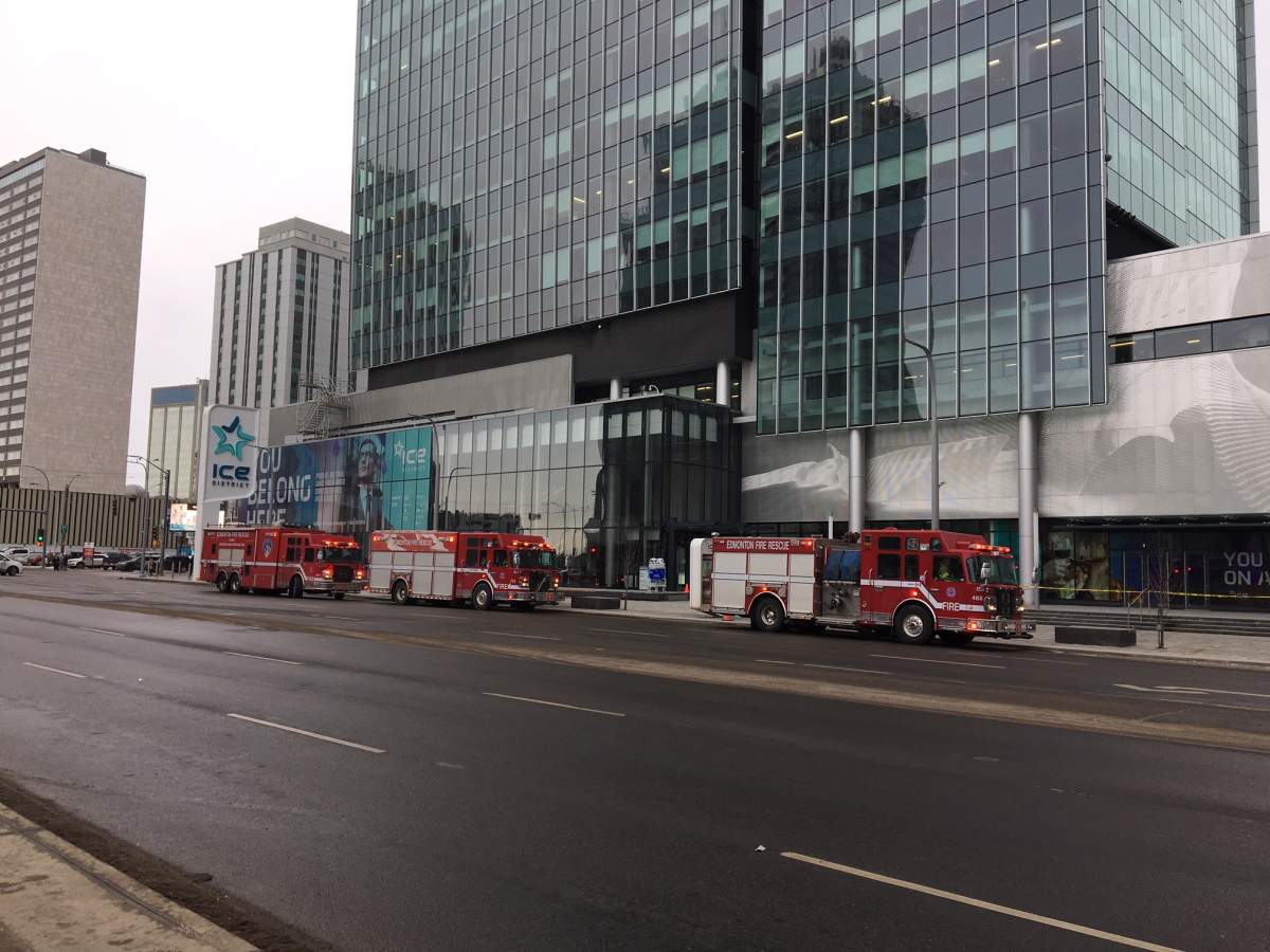 Police and emergency crews surrounding the Edmonton Tower on 104 Avenue and 101 Street. Thursday, March 1, 2018.