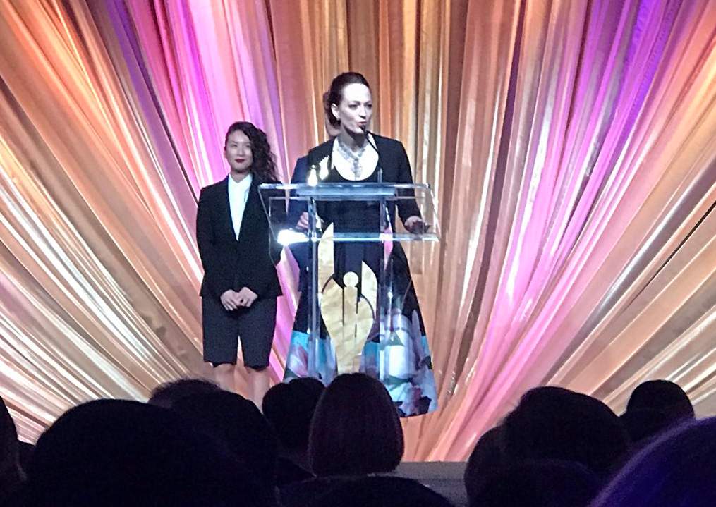 Global News' Carolyn Jarvis collects the award.