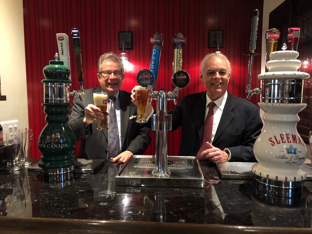 Sleeman Breweries founder John Sleeman (right) and former Minister of Agriculture, Food and Rural Affairs Jeff Leal.