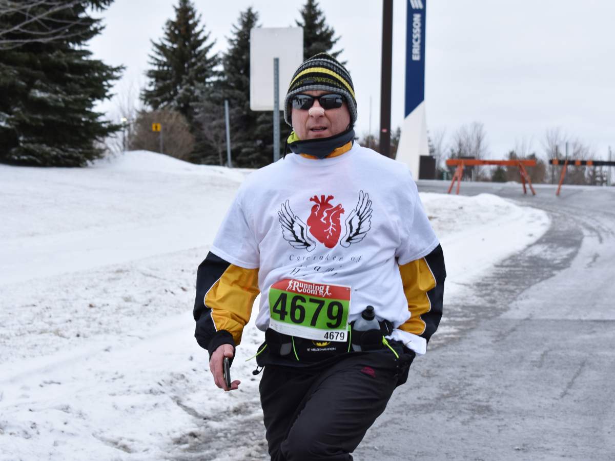 John Dickhout ran his first 10K over the weekend. He received a heart transplant in 2016 and remains in contact with his donor’s family who cheered him on at the race.