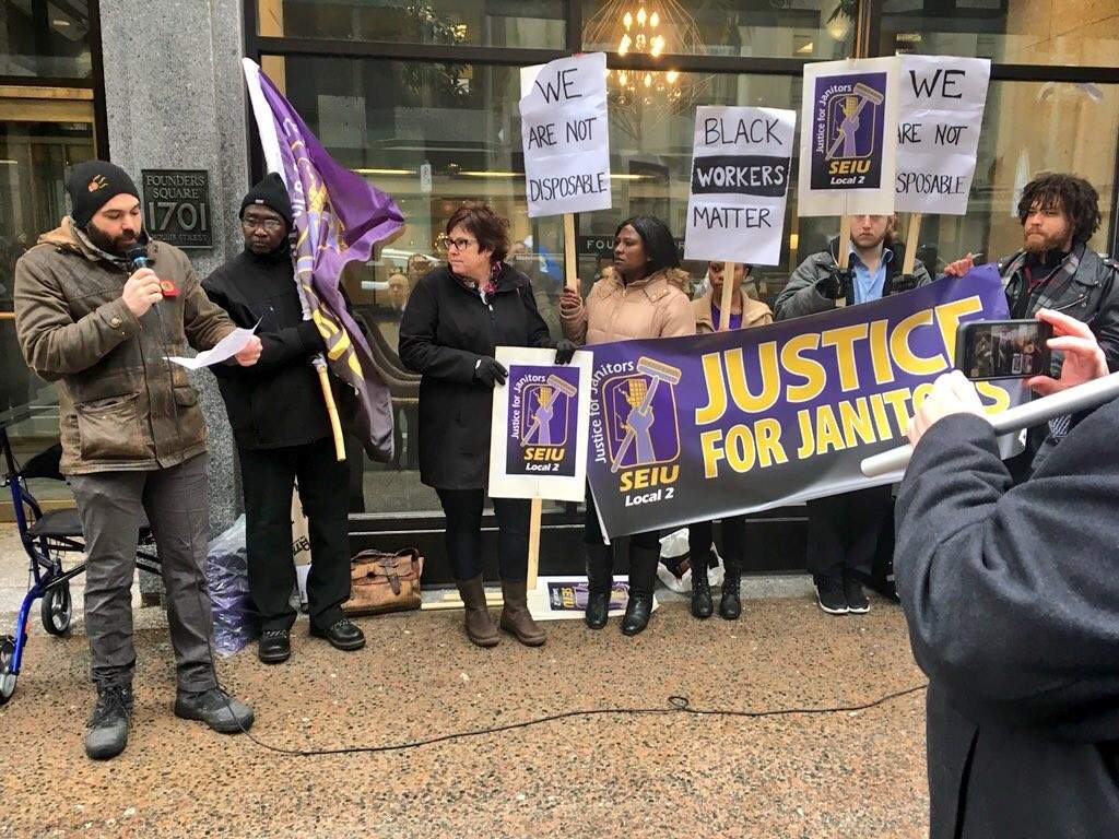 SEIU Local 2 members protest their supporters in front of Founders Square Halifax on March 23, 2018.