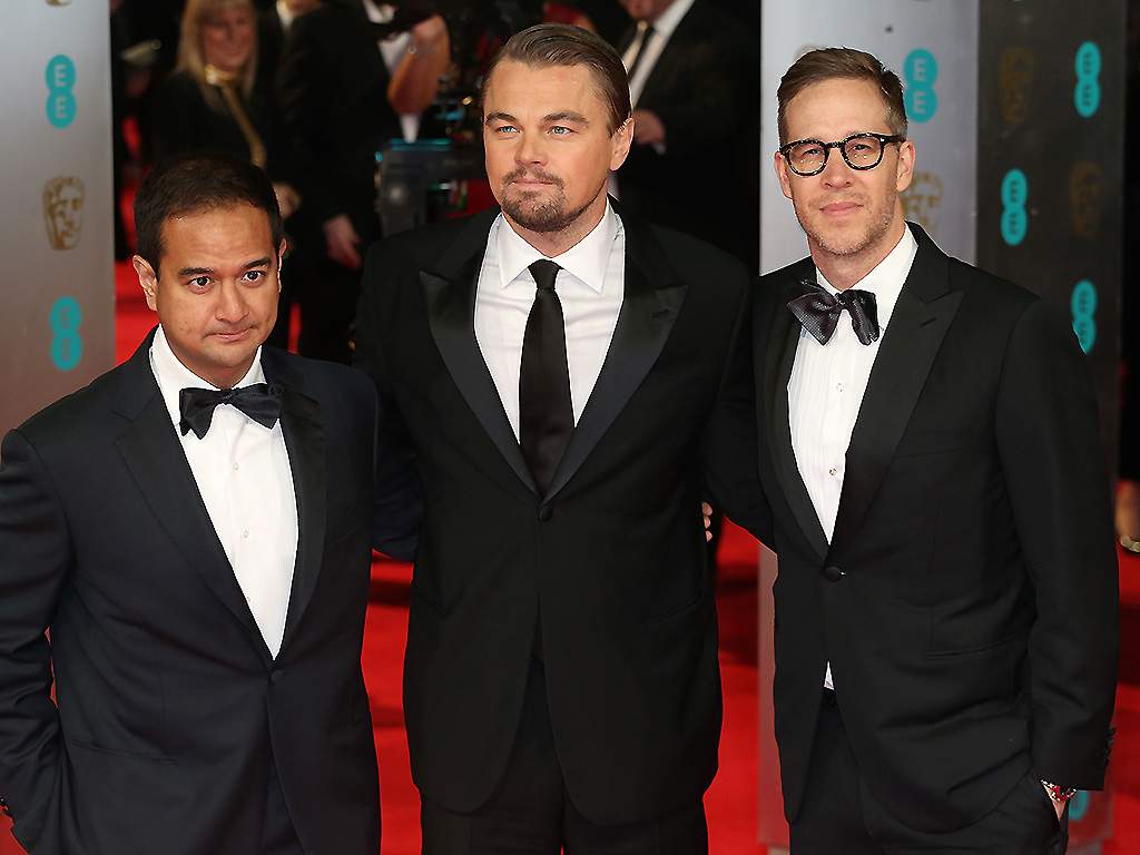 Producers Riza Aziz (L), Joey McFarland (R) and Leonardo DiCaprio attend the EE British Academy Film Awards 2014 at The Royal Opera House on February 16, 2014 in London, England.