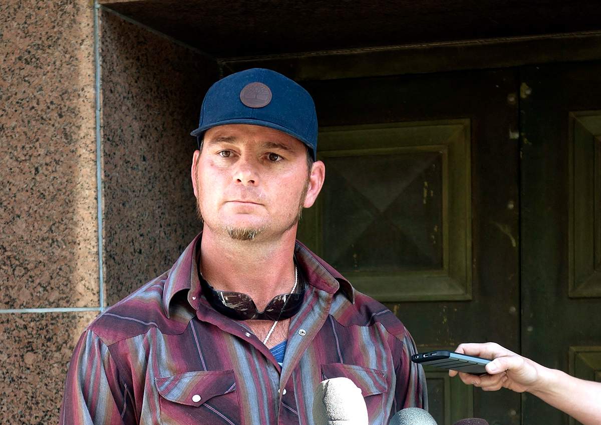 In this Jan. 26, 2018, file photo, Jason Freeman, Charles Manson’s purported grandson, speaks to reporters outside court in Los Angeles.