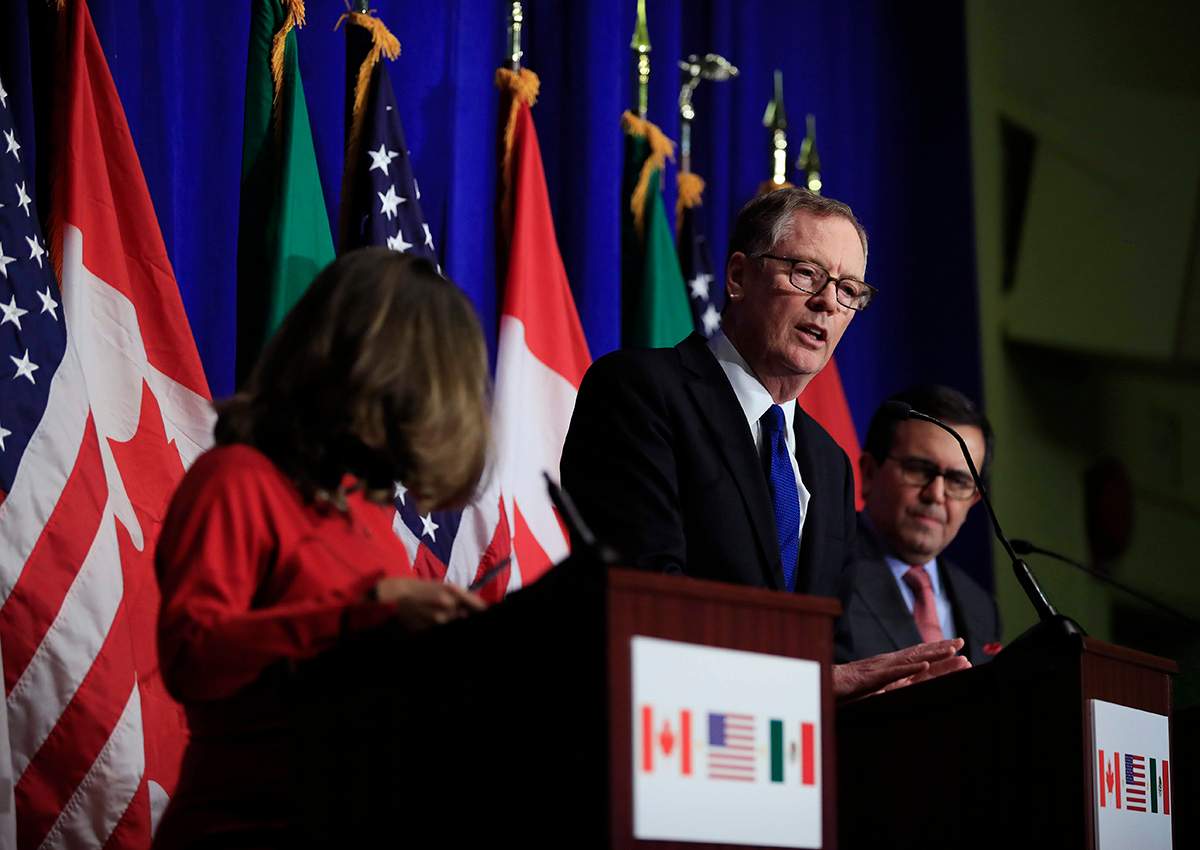 In this Oct. 17, 2017, file photo, U.S. Trade Representative Robert Lighthizer, centre, speaks during the conclusion of the fourth round of negotiations for a new North American Free Trade Agreement (NAFTA) in Washington.