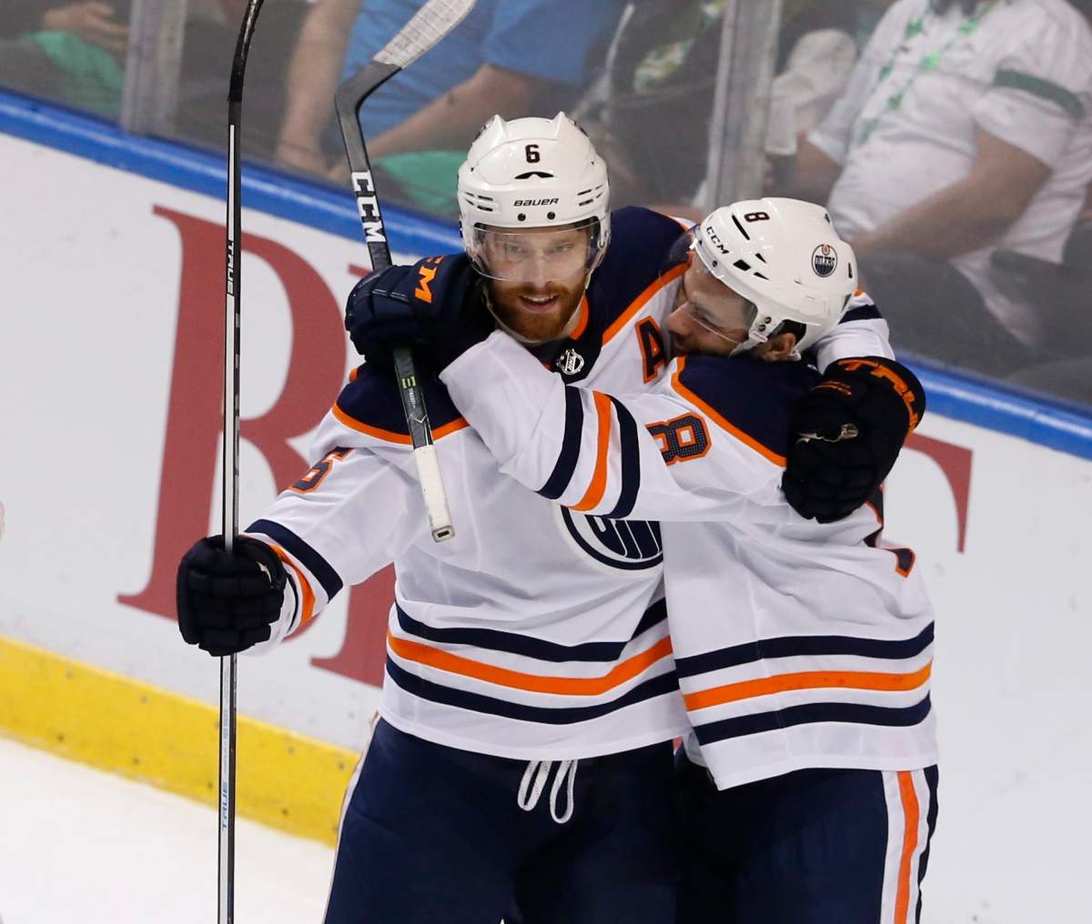 Edmonton Oilers defenseman Adam Larsson (6) celebrates his game-winning goal in the third period with teammate Ty Rattie (8) over the Florida Panthers during an NHL hockey game, Saturday, March 17, 2018, in Sunrise, Fla. The Oilers won the game 4-2. 