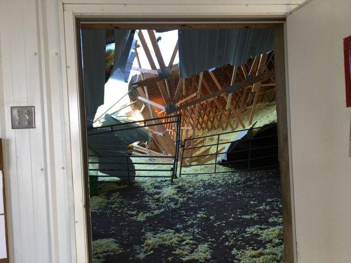 The roof of an Okotoks horse-boarding facility collapsed on Monday, March 19, 2018.