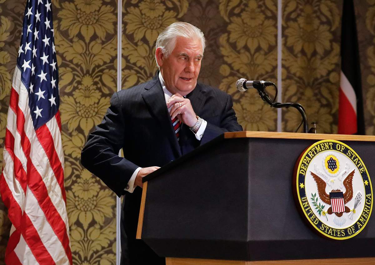 Rex Tillerson pulls out a note as he prepares for a speech during a joint news conference with Kenyan foreign minister Monica Juma (not pictured) at a Nairobi hotel in the capital Nairobi.