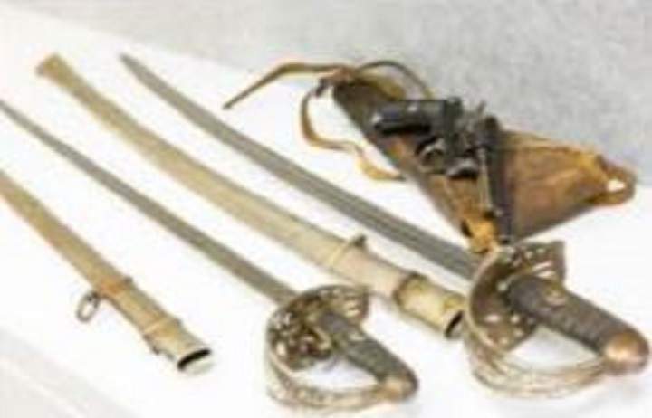 A revolver and two sabres from the family of an Australian who joined the Swiss Armed Forces in the 1880s.
