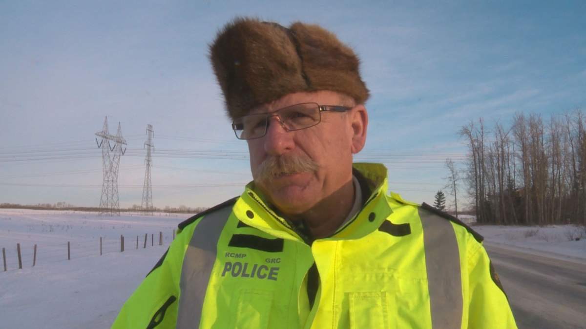 Evansburg RCMP officer Sgt. Brian Topham, 59, has been identified as the Mountie who was airlifted to hospital after being injured in a fatal exchange of exchange of gunfire west of Edmonton near Entwistle, Alta.