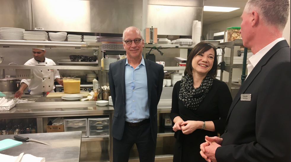 Richard Main (right) shows Minister Phillips and Energy Efficiency Alberta vice-president Darryl Hill energy-efficiency retrofits made at the Residence Inn Airport Marriott and Courtyard in Calgary.