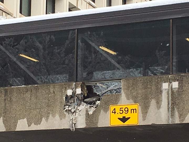 Emergency crews briefly blocked off Carlton Street after the skywalk overhead was hit by a vehicle passing under it.